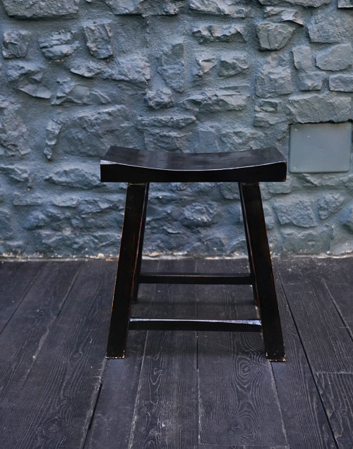Chair in black lacquered wood